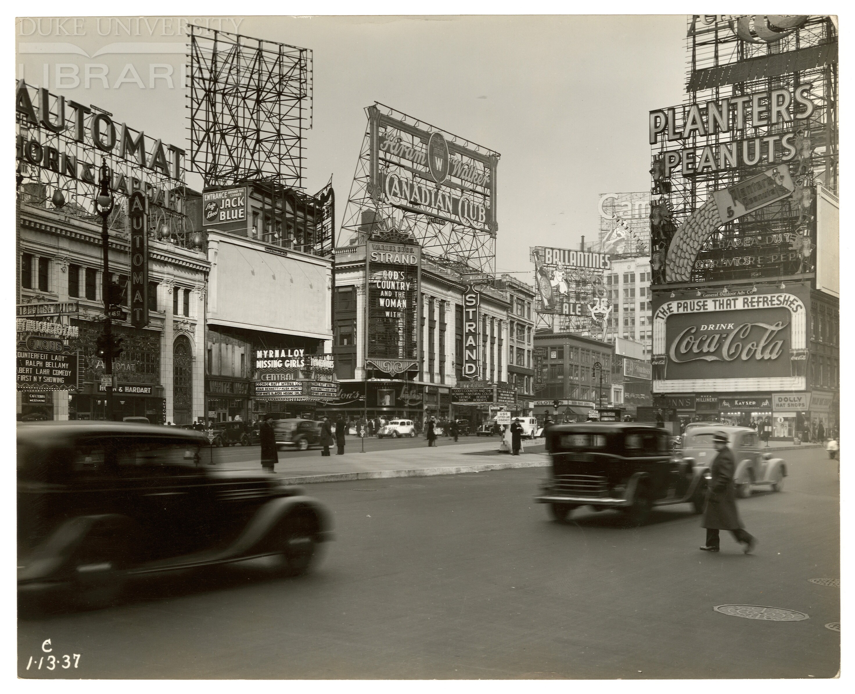 The massive new sign atop the Horn & Hardart Automat is hard to miss. It towers over the Globe and Central Theatres -- challenging the north advertising "Stack" for attention. January 13, 1937.