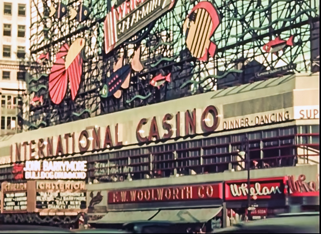 Early view of the building exterior, showing the Criterion Theatre and Wrigley's sign from 1937 film capture