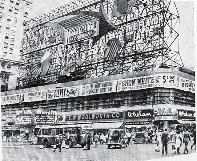 Early view of the building exterior, showing the Criterion Theatre and Wrigley's sign from 1940
