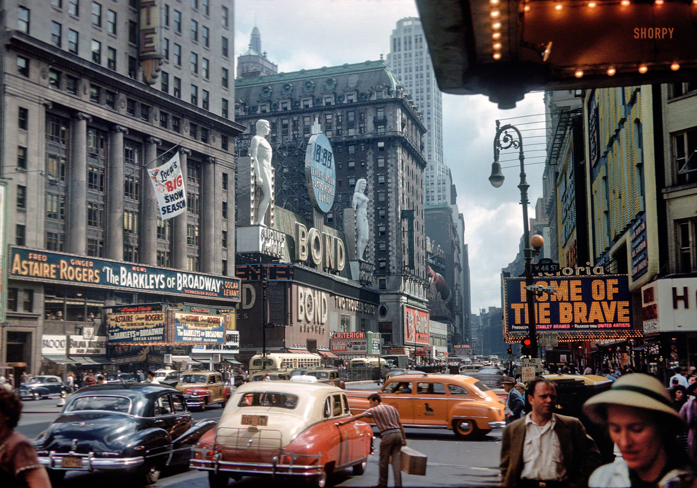 Bond statues and store in color, promoting 'Home of the Brave' in 1949