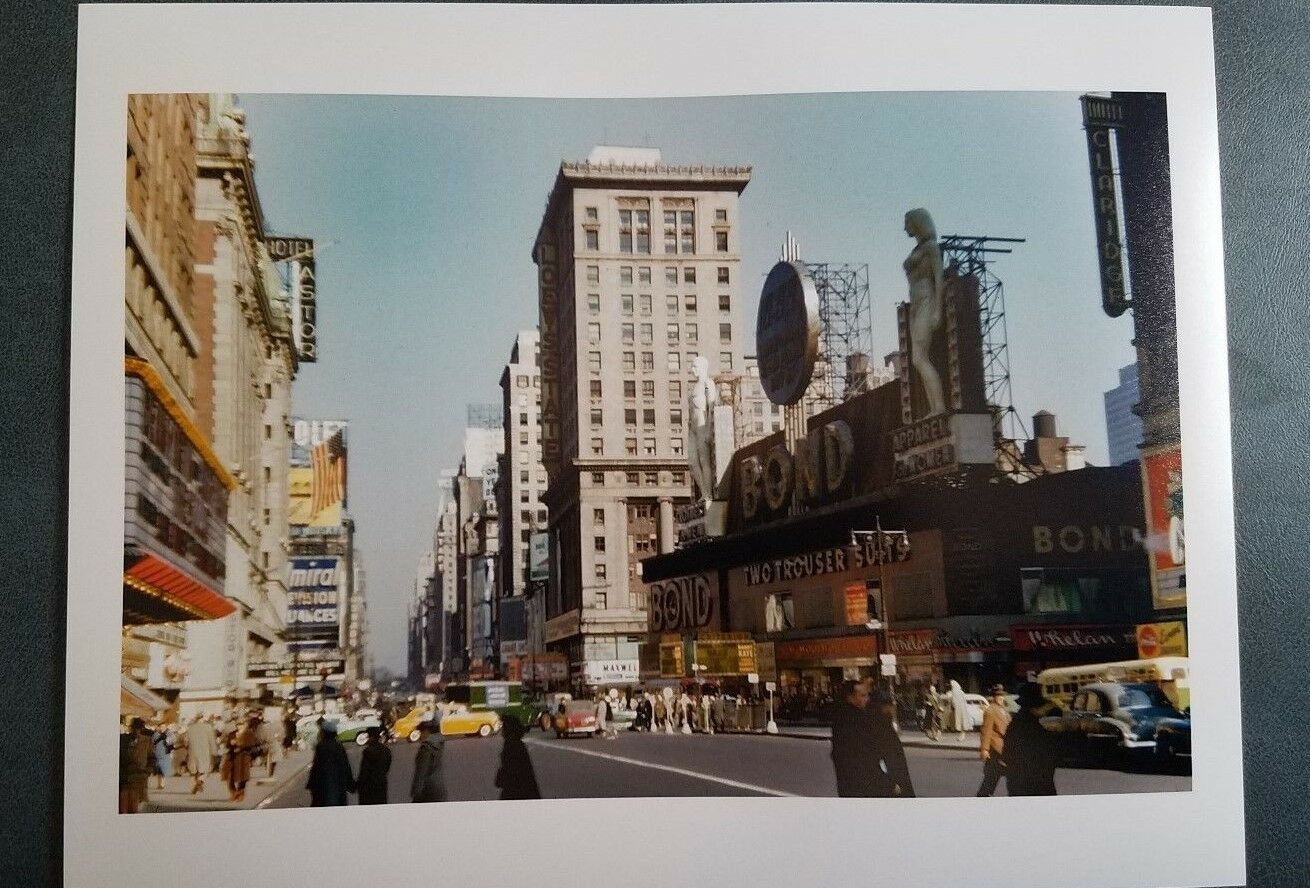 Color photo of Bond statues in Times Square, circa 1953