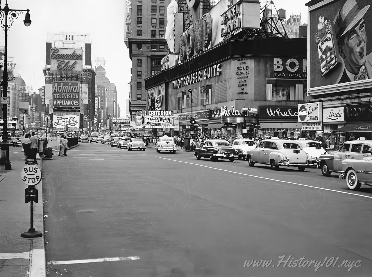 Times Square traffic with Bond building and new Pepsi sign in 1954